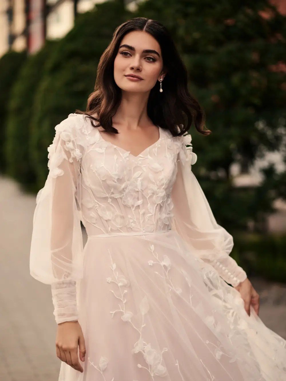 Photo of Model wearing a Modest Dresses Collection Gown