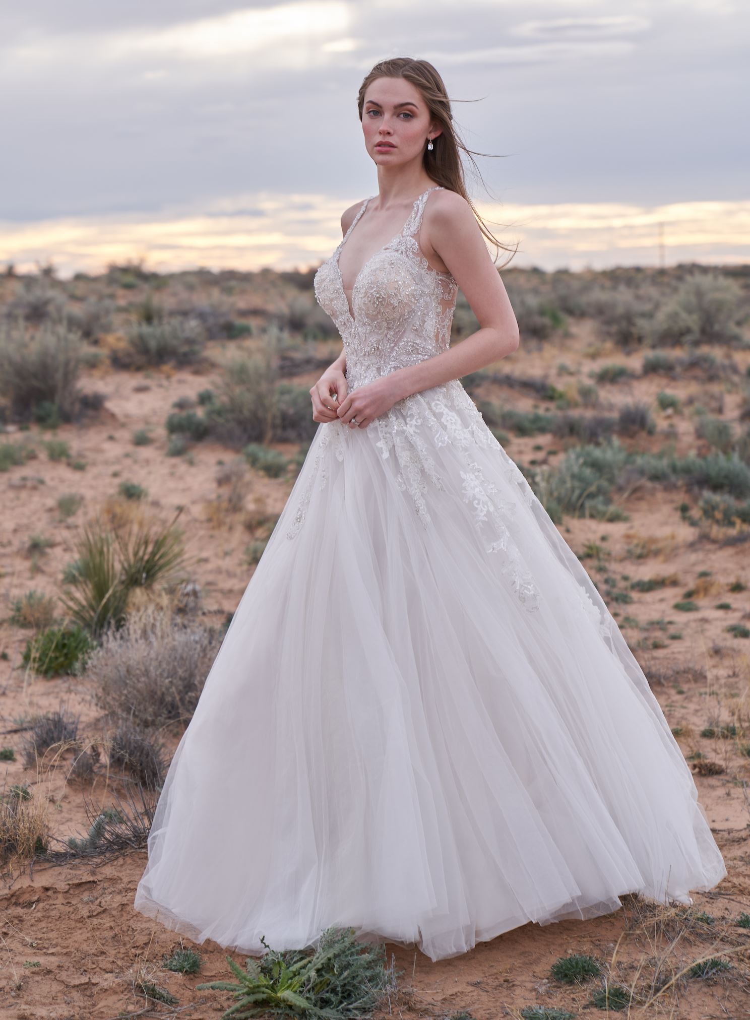 Photo of Model wearing a Allure Bridals gown