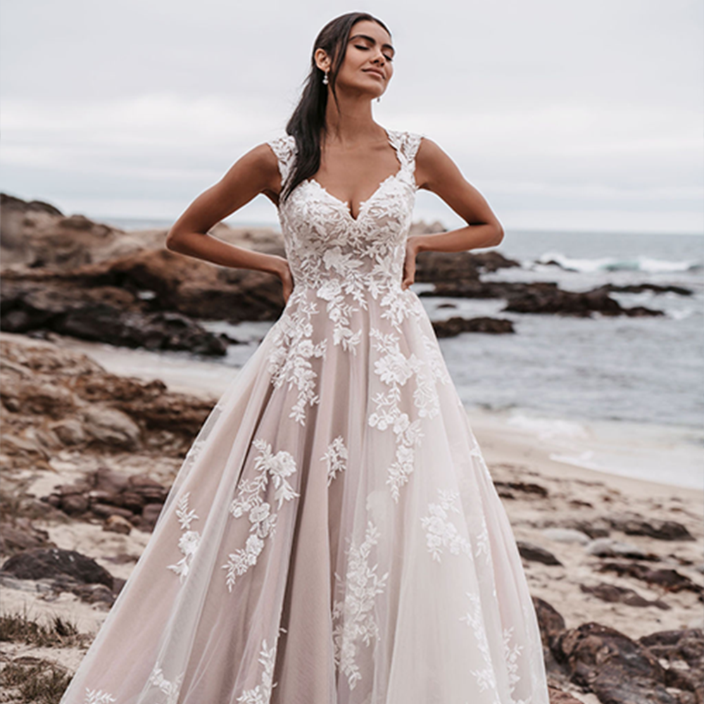 Photo of Model wearing a Allure Bridals gown