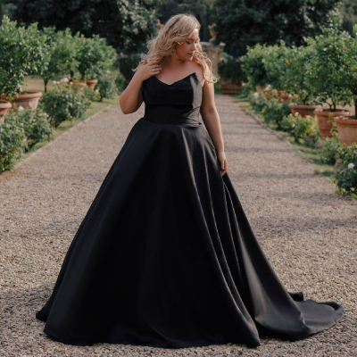 Photo of Model wearing a Plus-Size Dresses Collection Gown