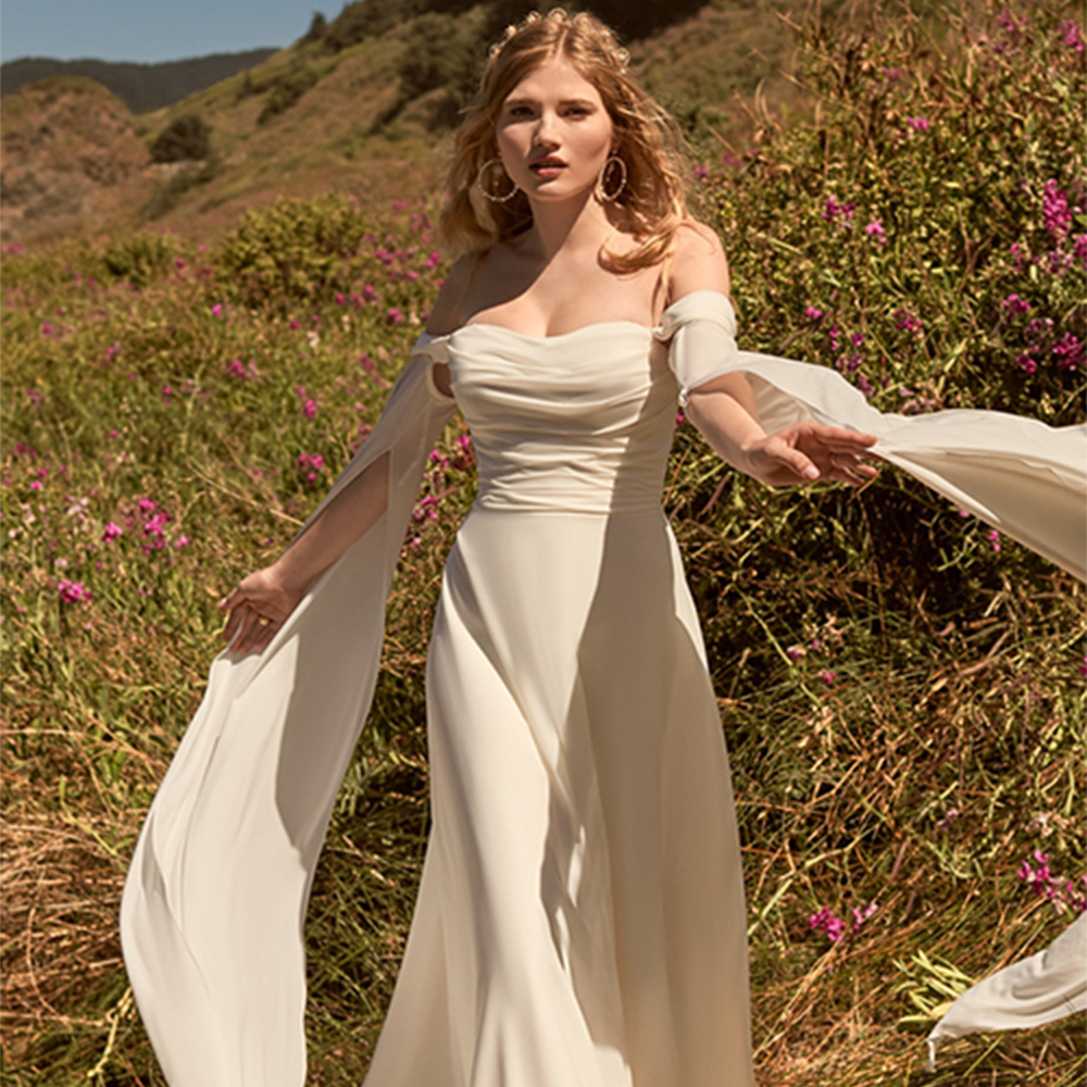Photo of Model wearing a Rebecca Ingram gown