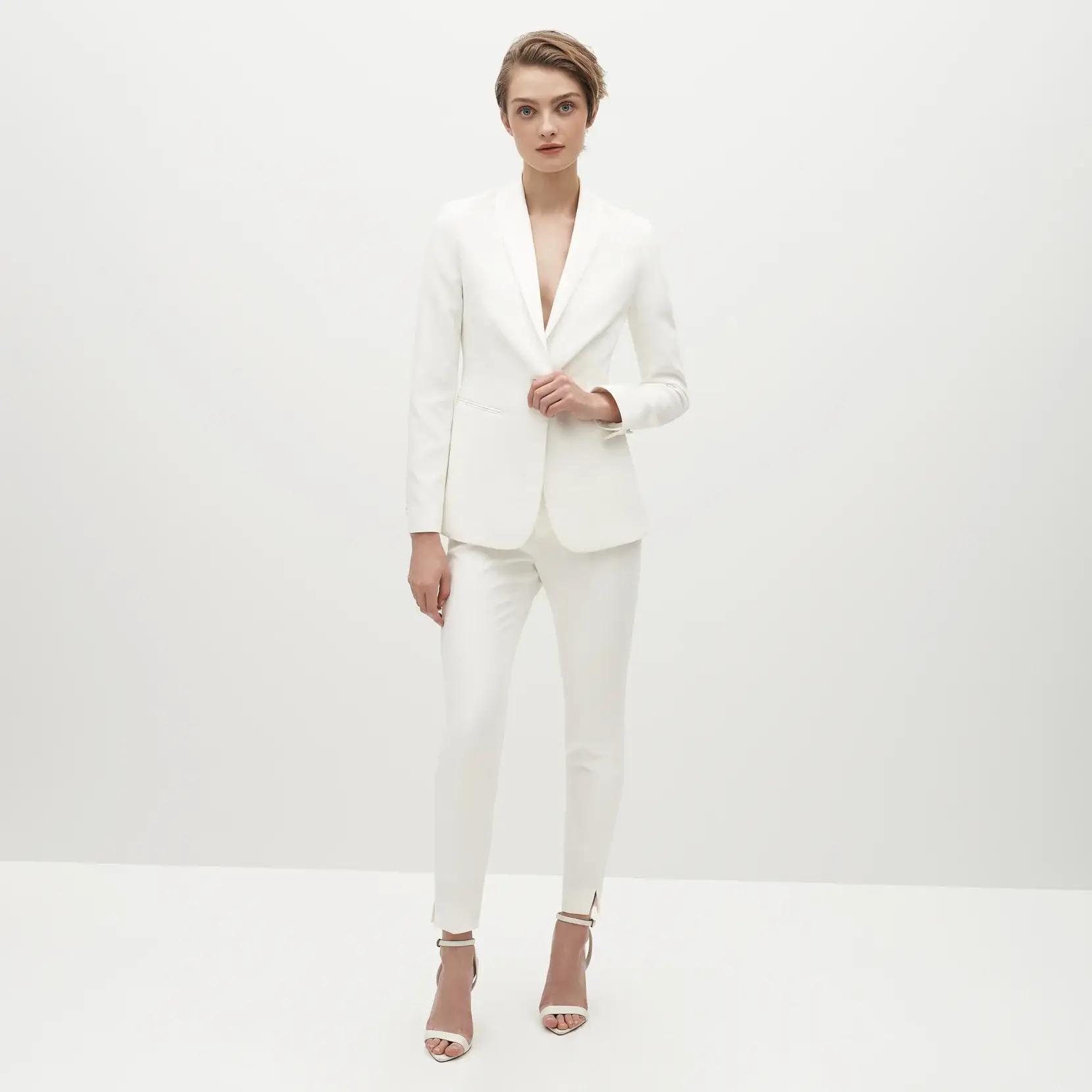 Woman in white suit